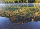 Grinnell Point reflected in Fishercap Lake.