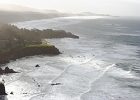 Looking down and south from the top of Cape Foulweather.  Devil&#39;s Punchbowl in the midground and Yaquina Head in the distance.