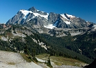 Return hike view is dominated by Mt. Shuksan.