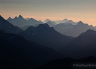 Morning haze and ridgelines from camp: the Canadian border peaks.  Skyline Divide.