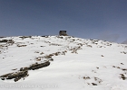 Approaching the Swiftcurrent Pass lookout cabin.  The last 500 vertical feet were agonizingly slow with 1-ft of snow and 8400-ft elevation.