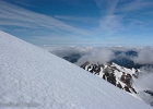 Nearing my objective; looking west towards Bellingham.  Marmot Ridge melting out down below.
