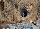 The cliff bisecting the beach in the village of Oceanside has a tunnel to get you closer to Arch Rock and Cape Mears.