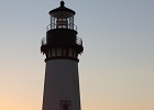 Yaquina Head lighthouse, Oregon&#39;s tallest, at sunset.