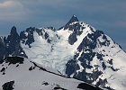 Mt. Shuksan and Nooksack Tower catch a bit of light on a mild, overcast day.  Seen from our lunch spot on Hannegan Peak.