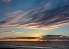 I'm not a fan of sunset photos, but this is a pretty nice view from our beach house.